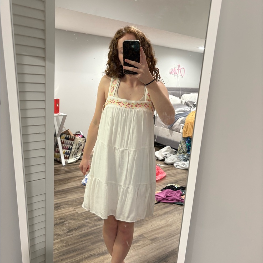 White Sleeveless Dress with Embroidered Details